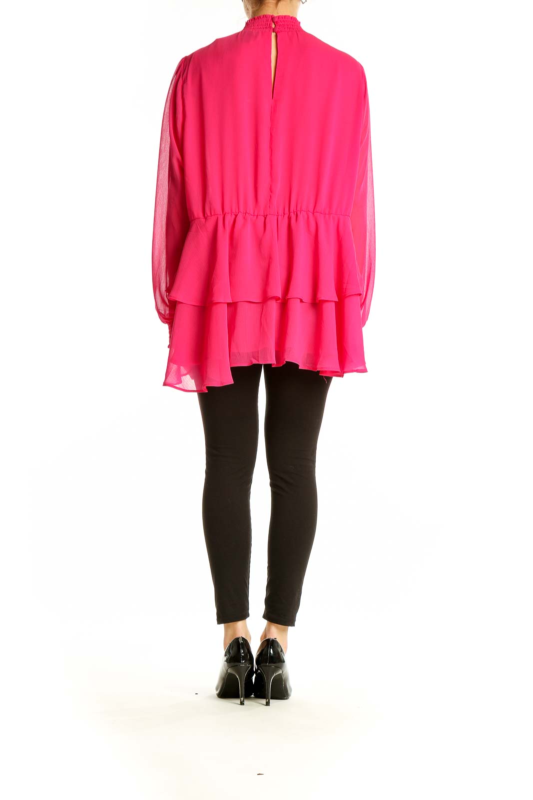 Back view of hot pink ruffled chiffon blouse from Torrid