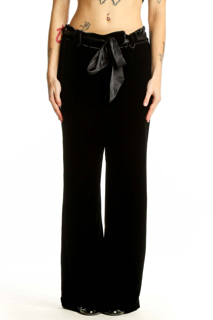 Front view of Ann Taylor black wide-leg pants with satin waist tie