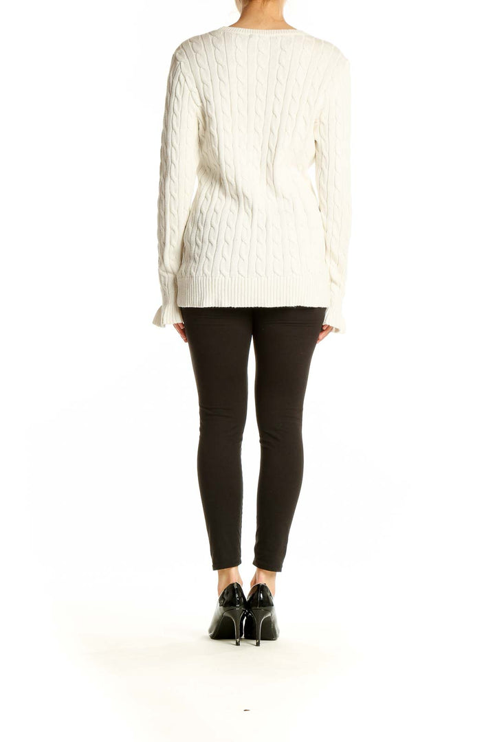 Side view of Lauren Ralph Lauren white cable knit cotton sweater on model