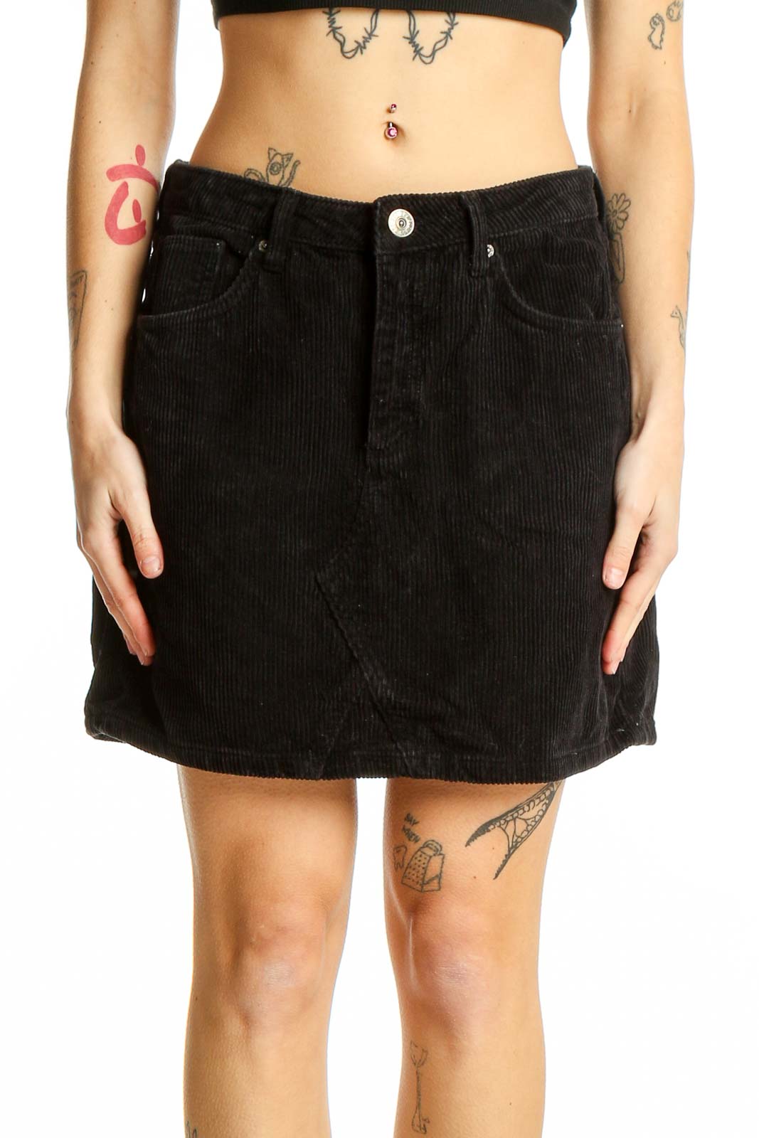 Front view of BDG black corduroy mini skirt with button closure