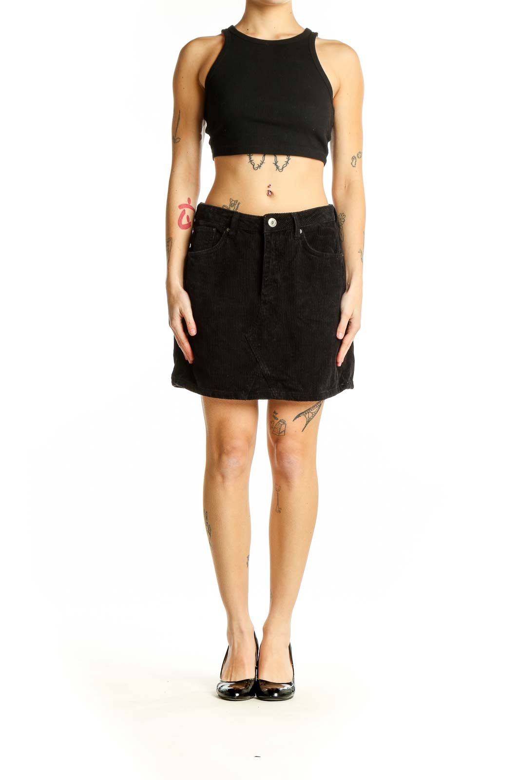 Front view of BDG black corduroy mini skirt with button closure