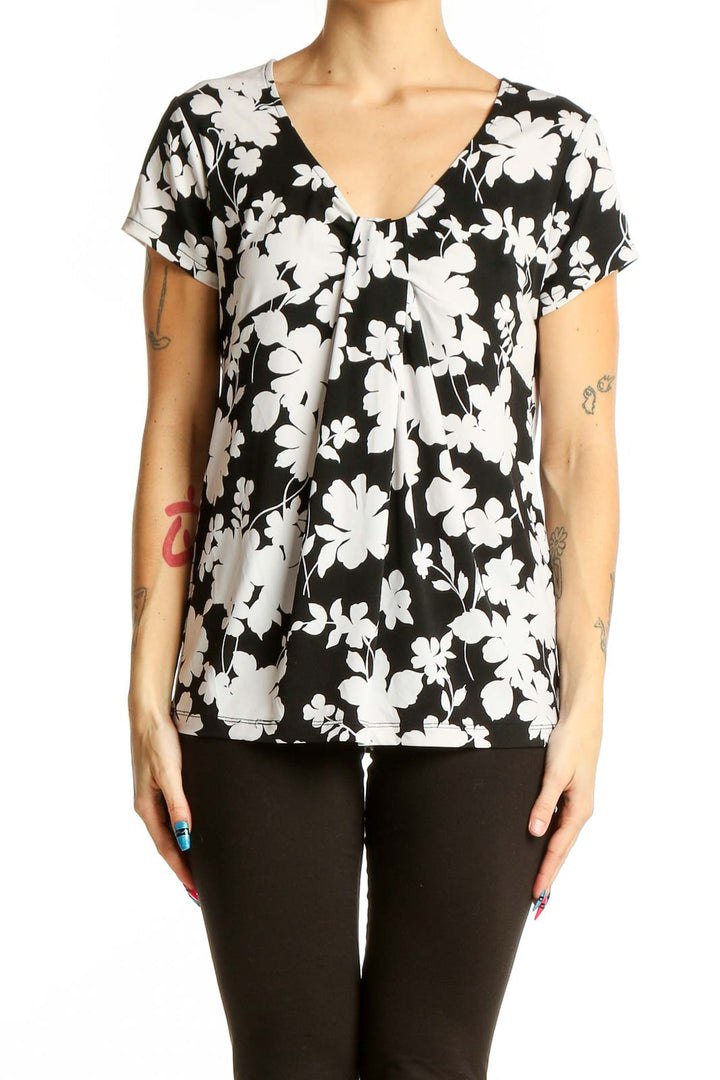 Front view of Rafaella Black and White Floral V-Neck Top