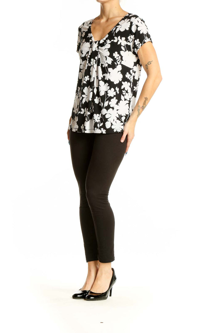 Front view of Rafaella Black and White Floral V-Neck Top