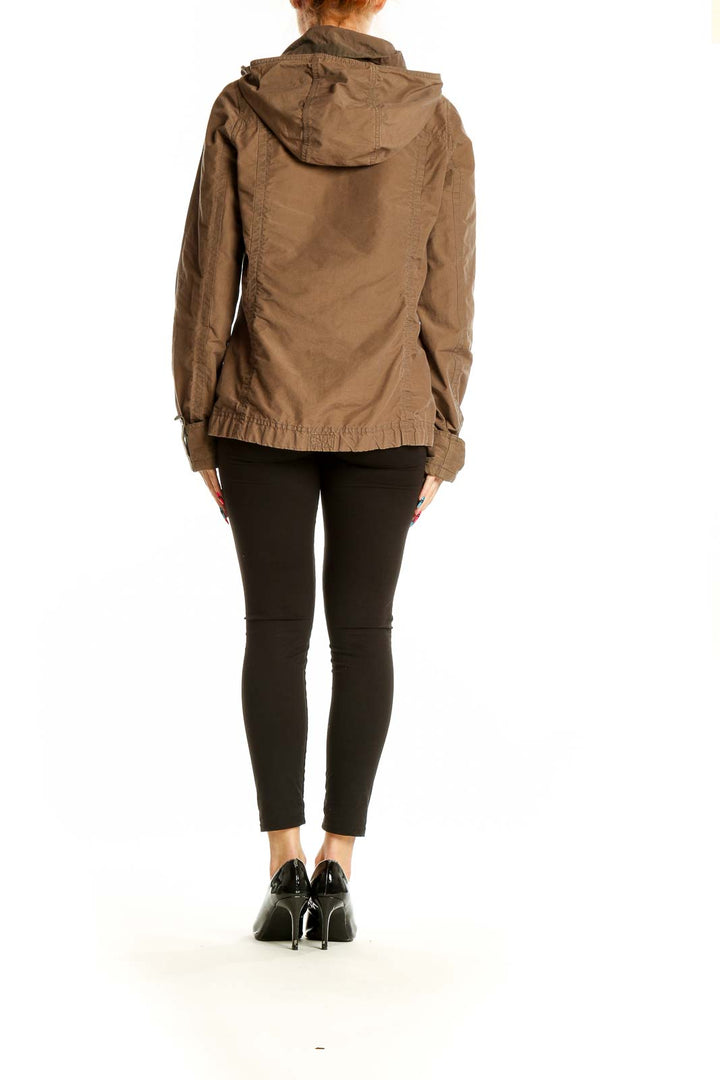 Back view of brown Columbia zip-up jacket on model