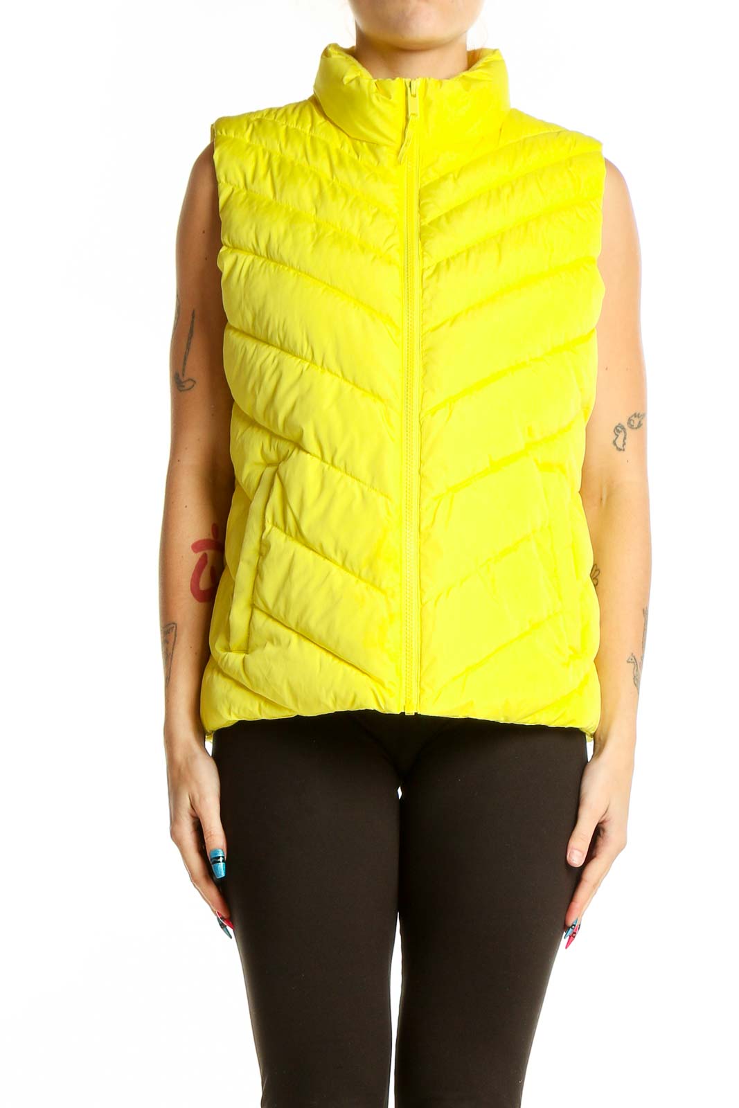 Front view of yellow quilted puffer vest from Gap