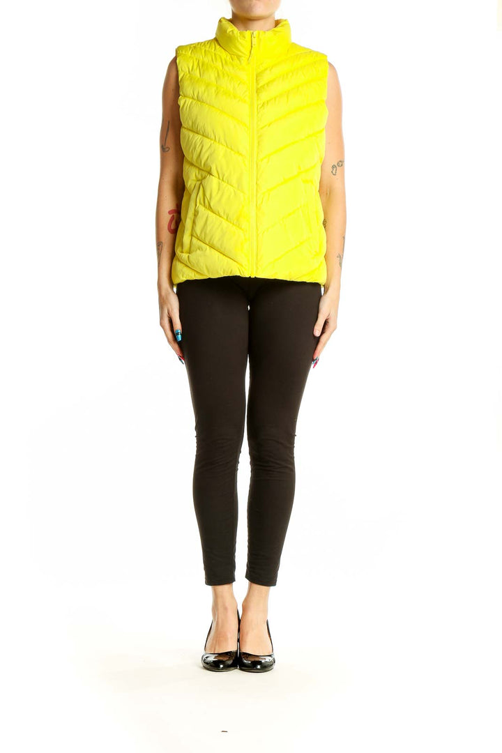 Front view of yellow quilted puffer vest from Gap