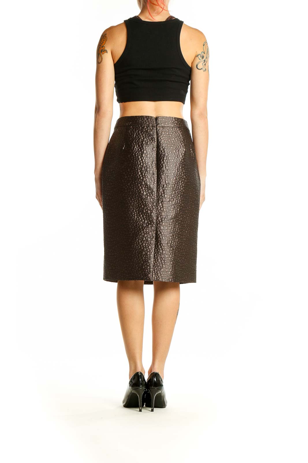 Side view of model wearing J.Crew brown textured pencil skirt with black top