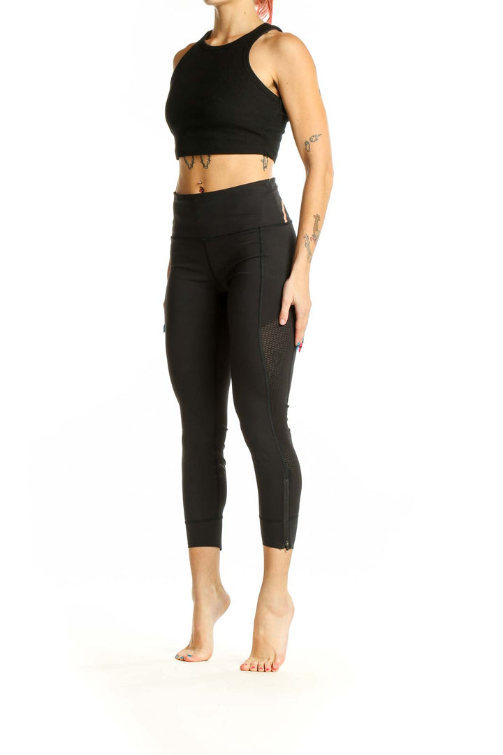 Front view of Athleta black activewear set with crop top and leggings