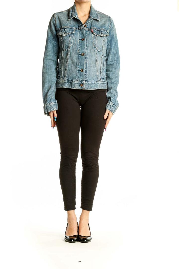 Front view of Levi's light blue denim jacket with button-up front and chest pockets