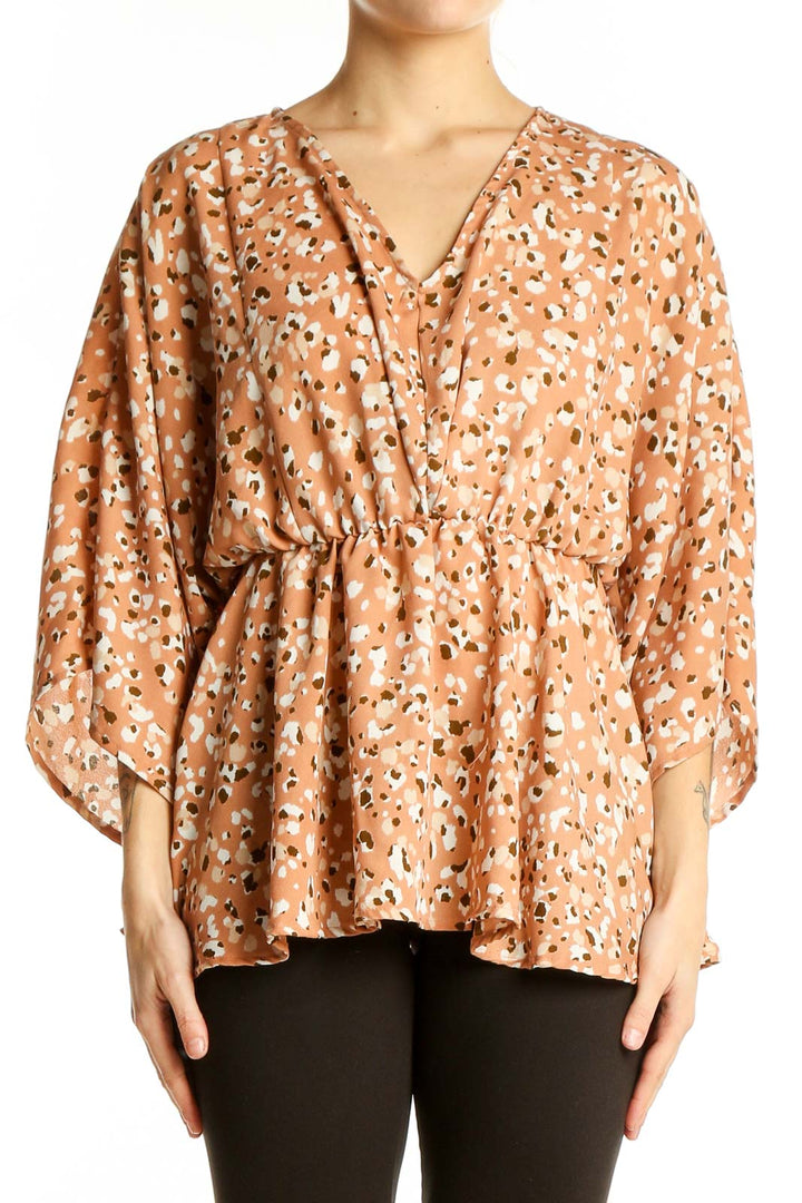 Front view of Gilli peach leopard print kimono blouse with wrap style and wide sleeves