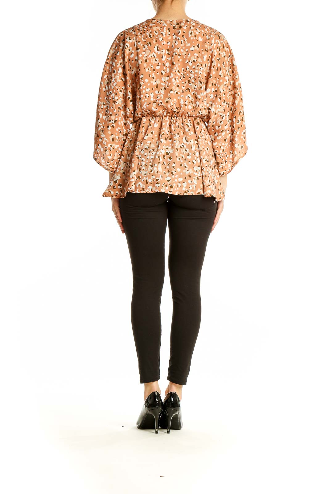 Side view of Gilli peach leopard print kimono blouse showing flowy silhouette and elastic waist