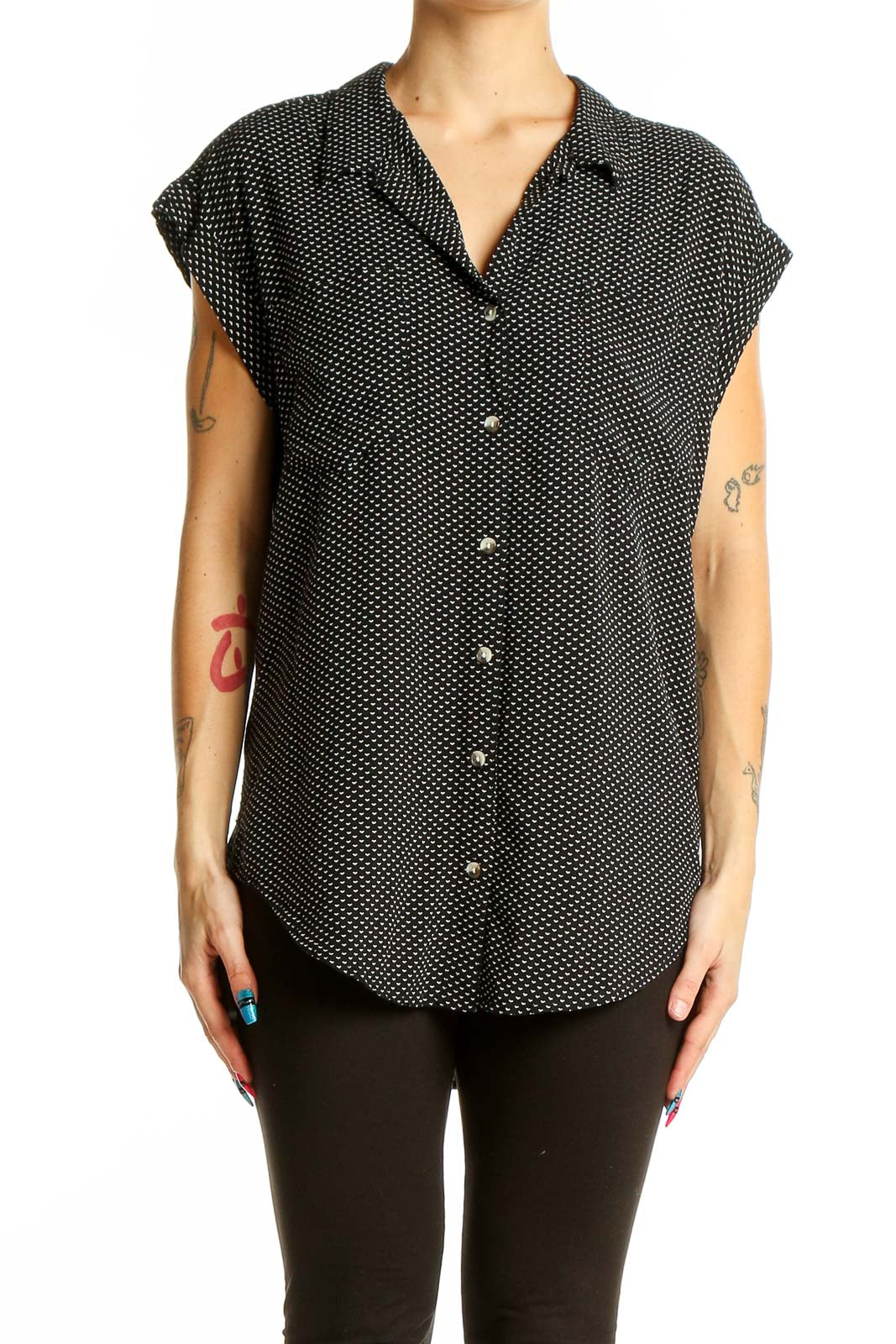 Front view of Jachs Girlfriend black polka dot sleeveless button-up top