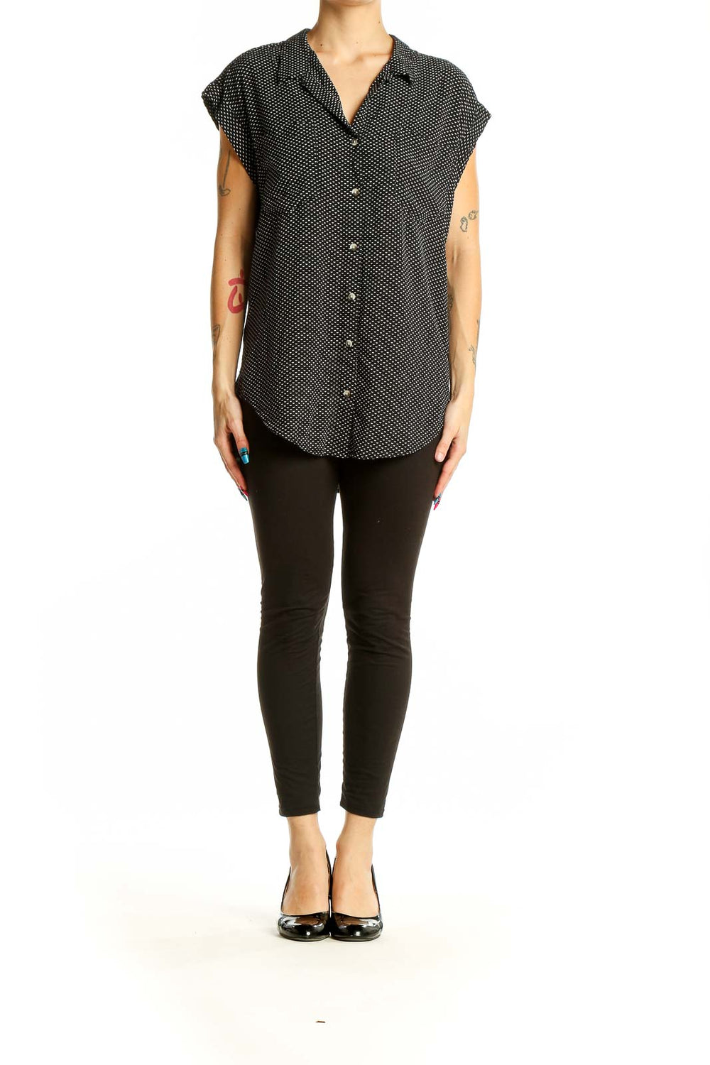 Front view of Jachs Girlfriend black polka dot sleeveless button-up top