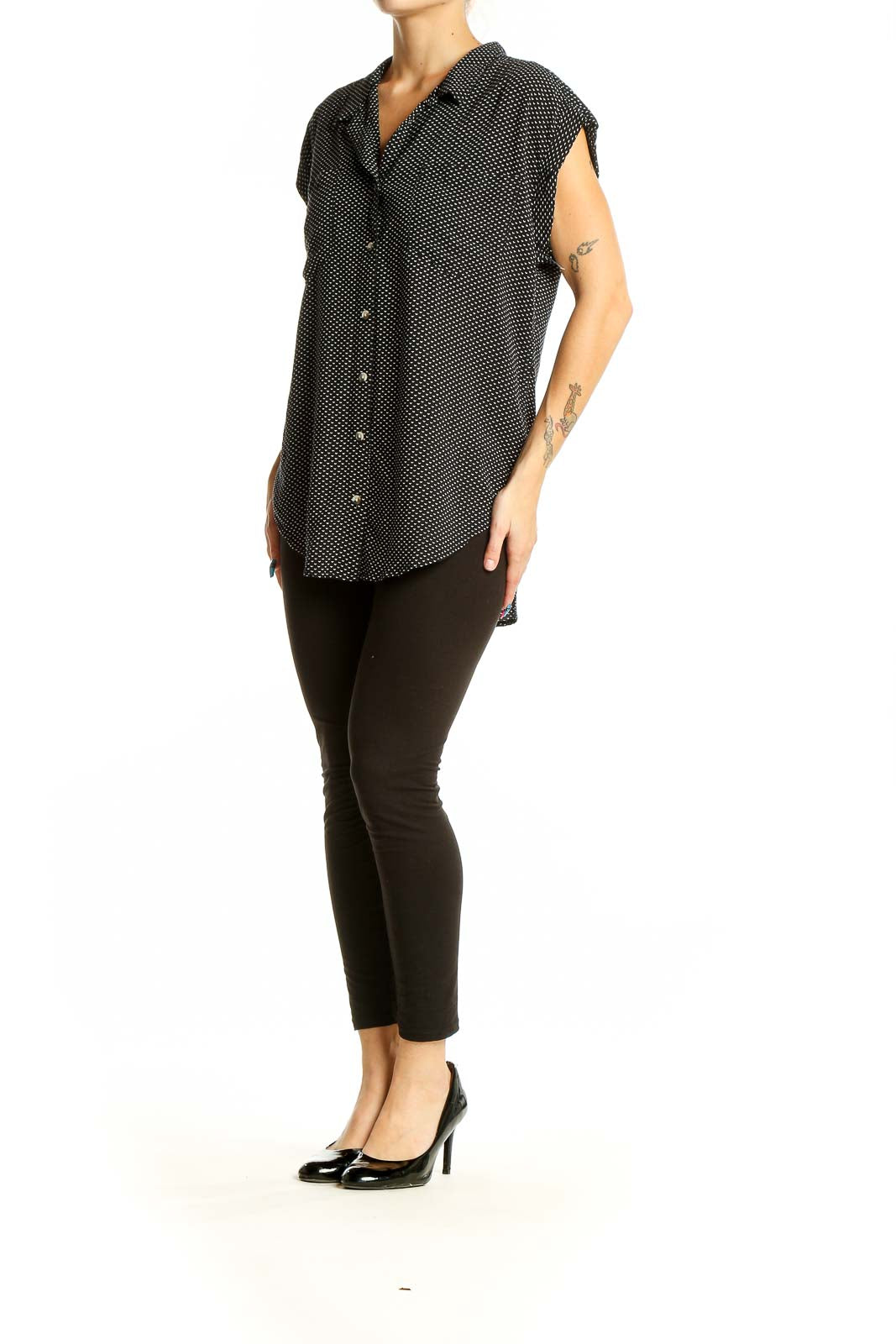 Front view of Jachs Girlfriend black polka dot sleeveless button-up top