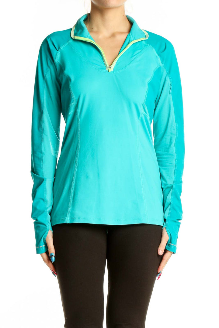 Front view of teal Lululemon quarter-zip athletic top