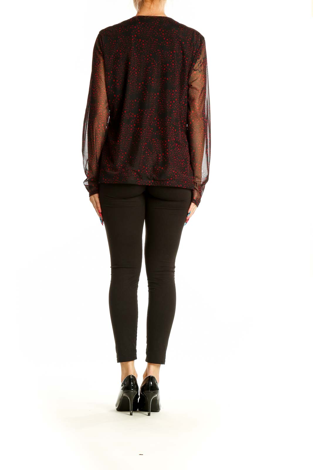 Back view of INC black and red polka dot blouse with sheer long sleeves