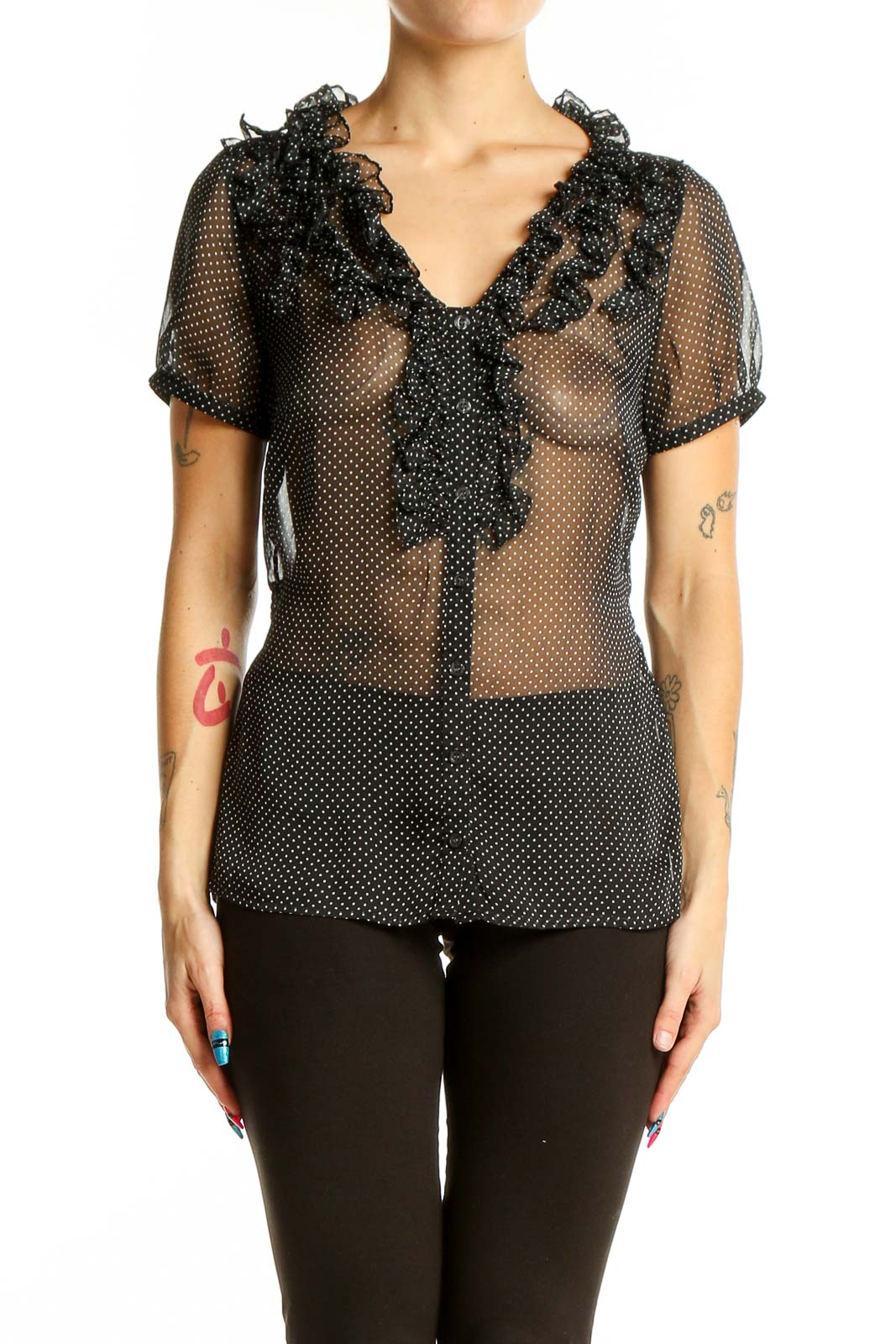 Front view of black sheer polka dot blouse with ruffle neckline from The Limited