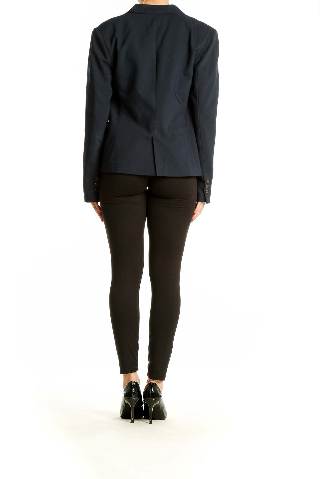 Side view of Philosophy navy single-button blazer on model with black pants