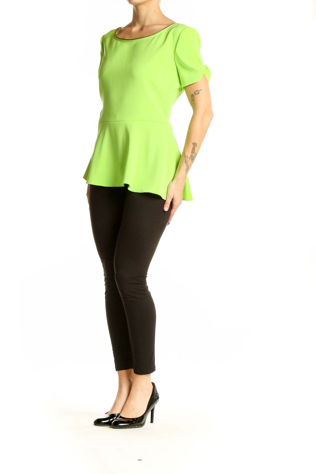 Front view of T Tahari lime green peplum short sleeve top