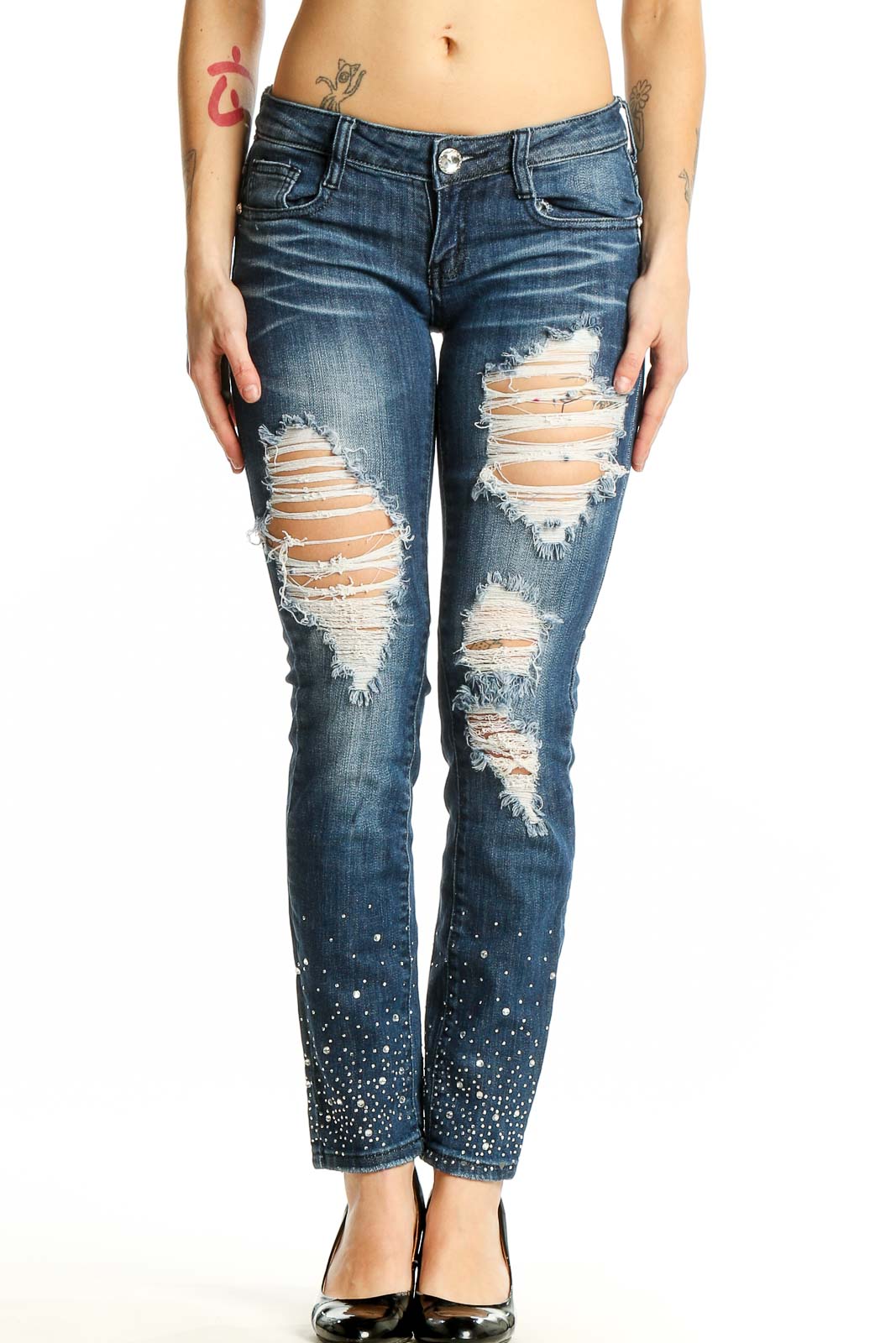 Front view of Machine blue distressed skinny jeans with embellishments