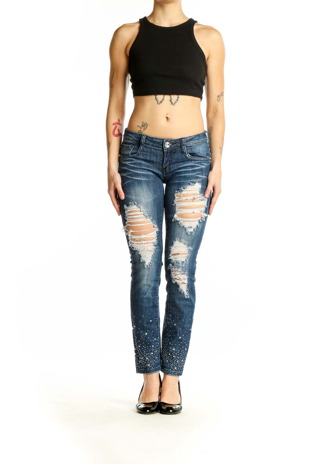 Front view of Machine blue distressed skinny jeans with embellishments