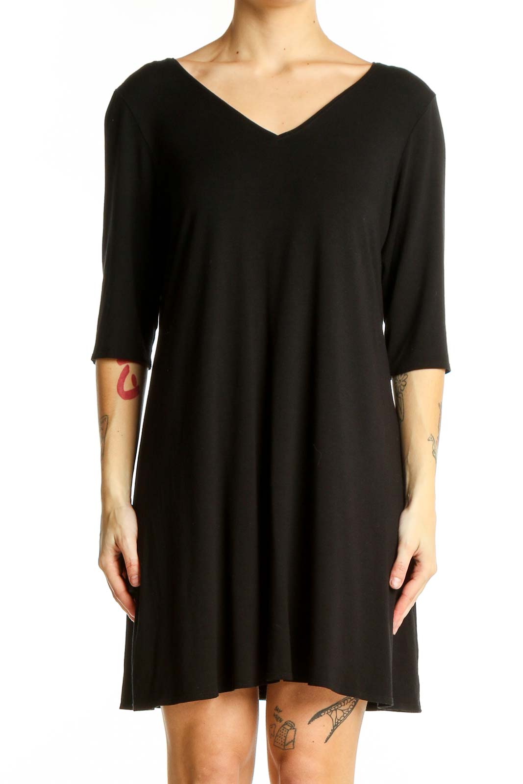 Front view of Eileen Fisher black V-neck flowy tunic top