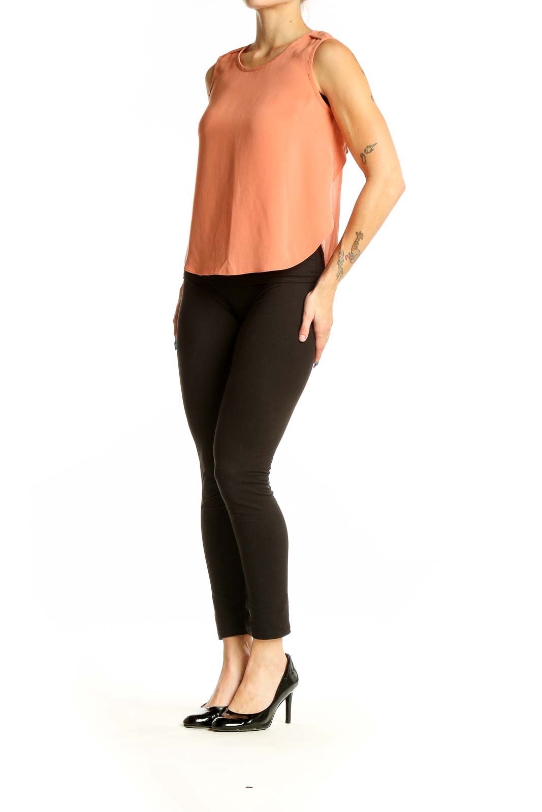 Front view of Rag & Bone peach sleeveless blouse on model