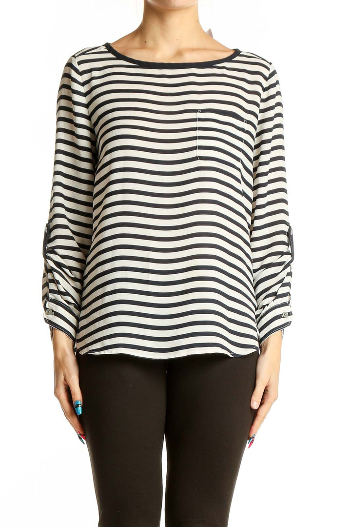 Front view of LOFT black and white striped polyester blouse with long sleeves