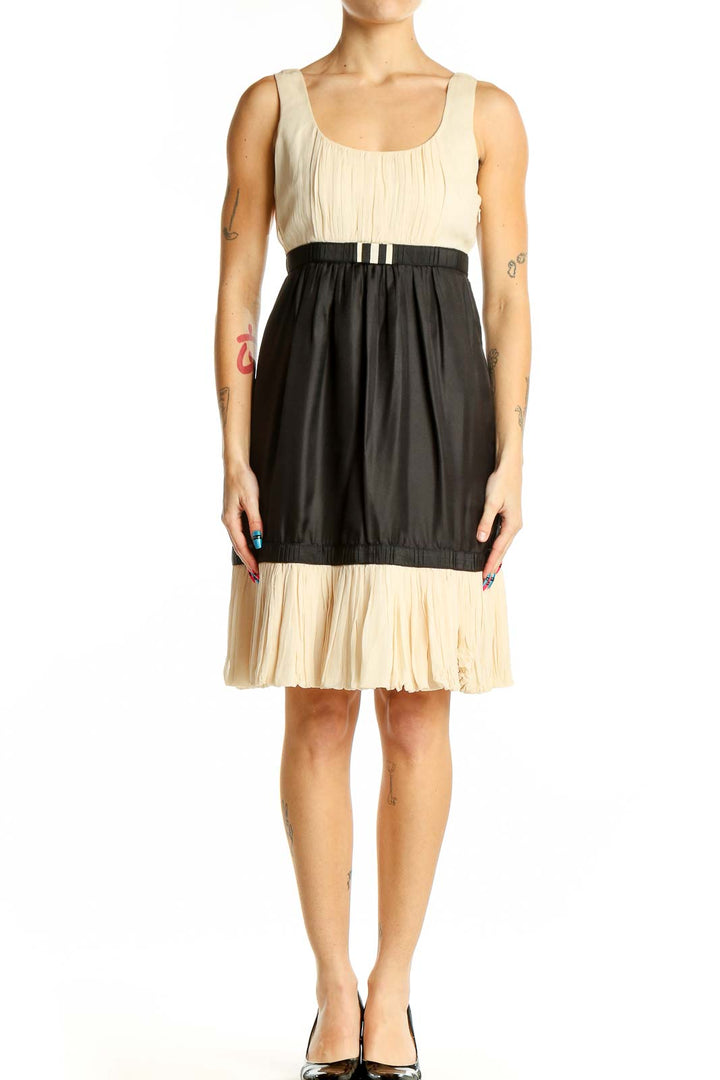 Front view of Yoana Baraschi cream and black color block sleeveless dress