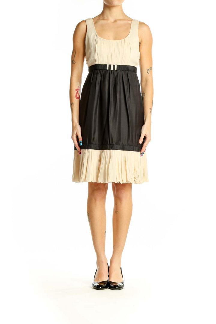 Front view of Yoana Baraschi cream and black color block sleeveless dress