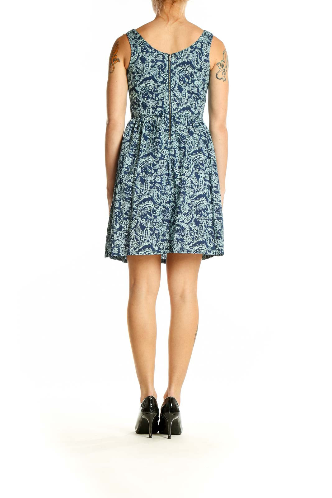 Side view of Levi's blue paisley cotton sleeveless dress showing gathered waist