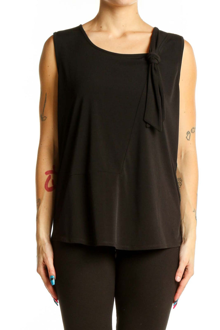 Front view of DKNY black sleeveless top with knot detail