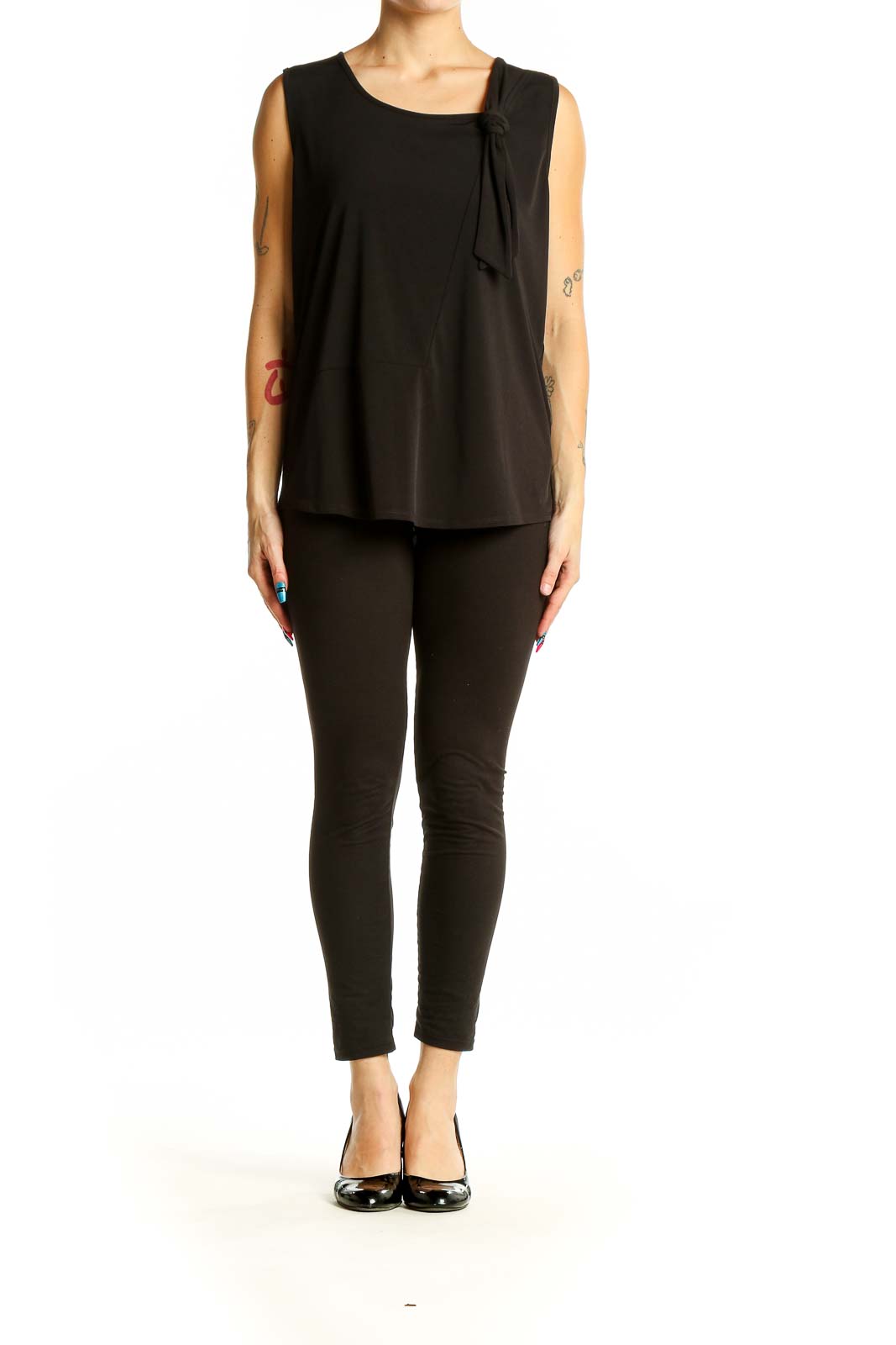 Front view of DKNY black sleeveless top with knot detail