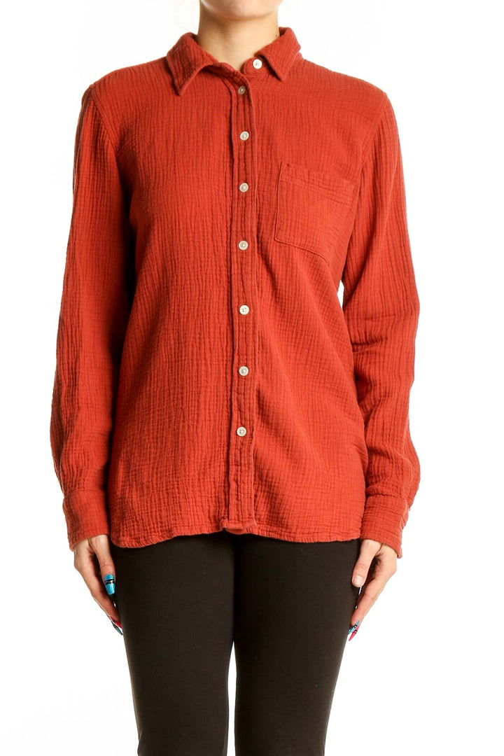 Front view of J.Crew red cotton button-down shirt with chest pocket