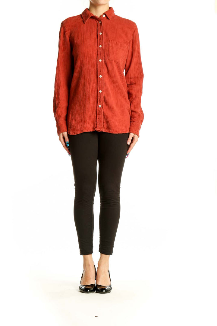 Front view of J.Crew red cotton button-down shirt with chest pocket