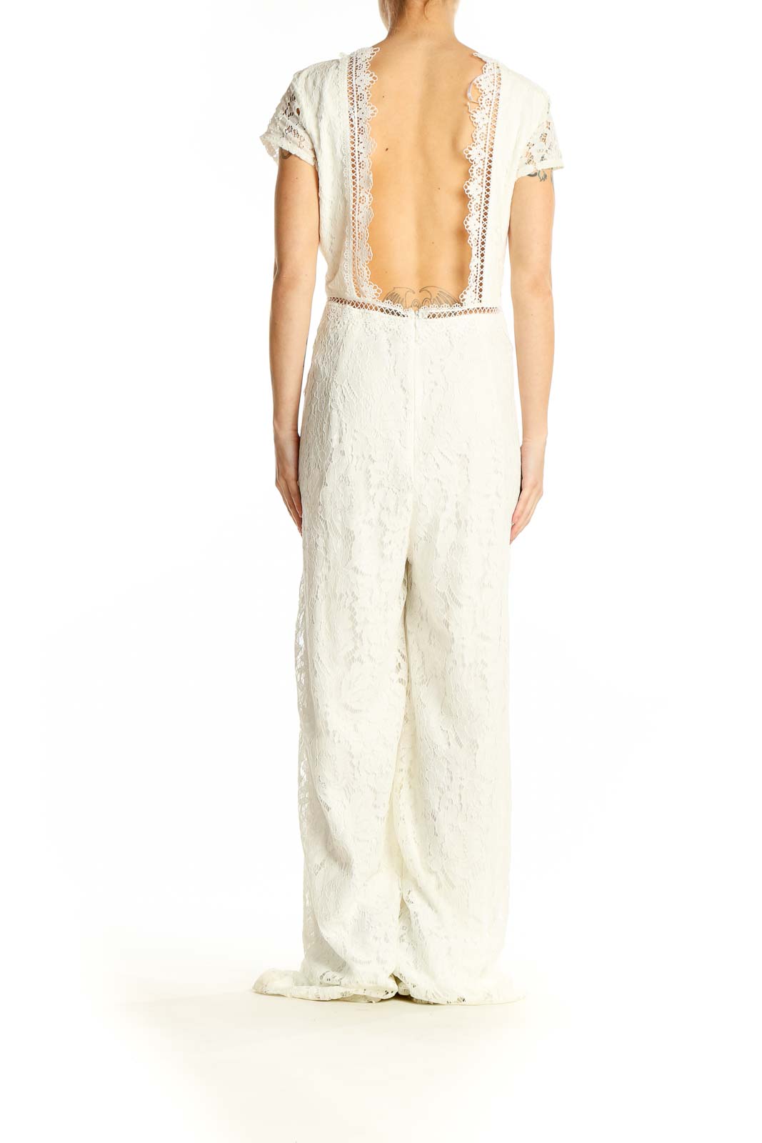 Side view of Lulu's white lace V-neck wide-leg jumpsuit