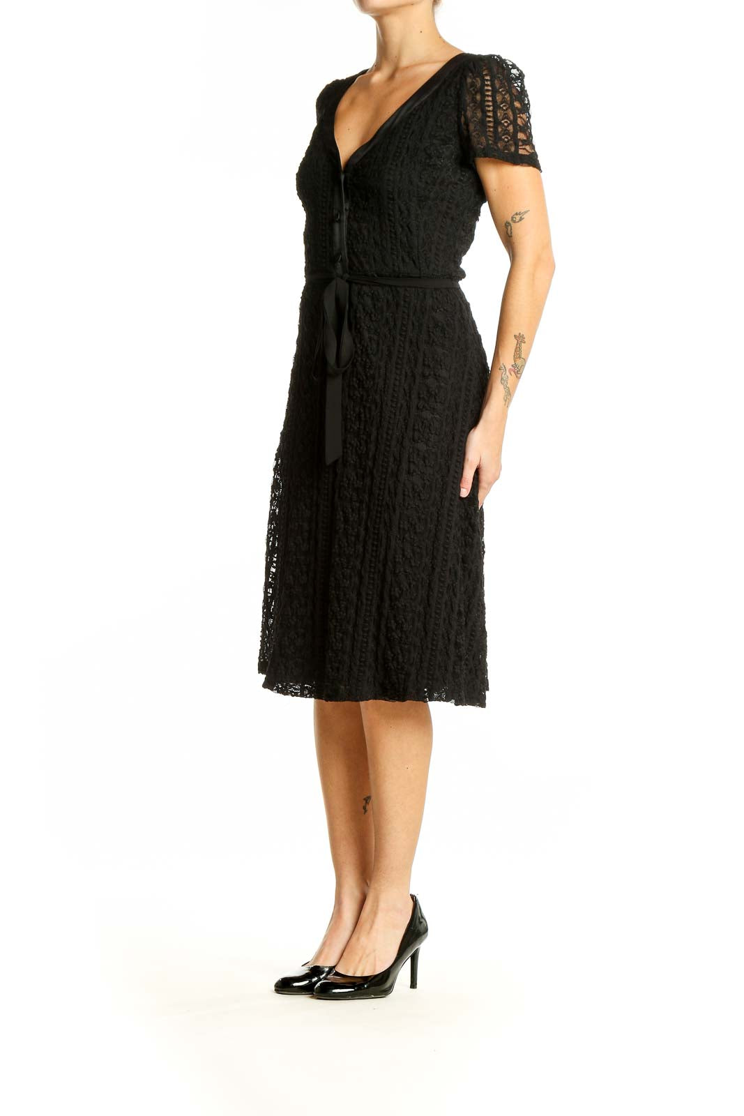 Front view of Betsy Johnson black lace midi dress with V-neck and button-front