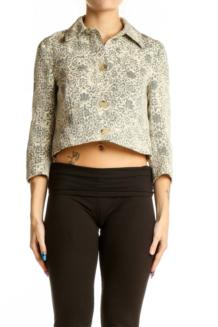 Front view of Theory beige cropped jacket with gray floral pattern