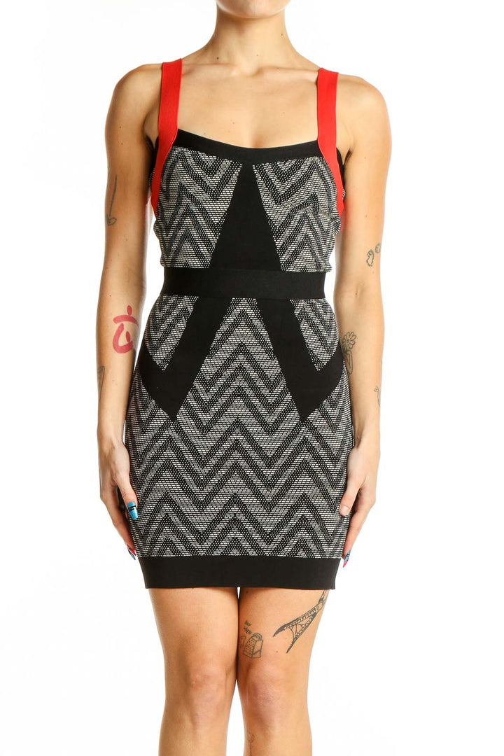 Front view of MARCIANO black and gray chevron bodycon dress with red straps