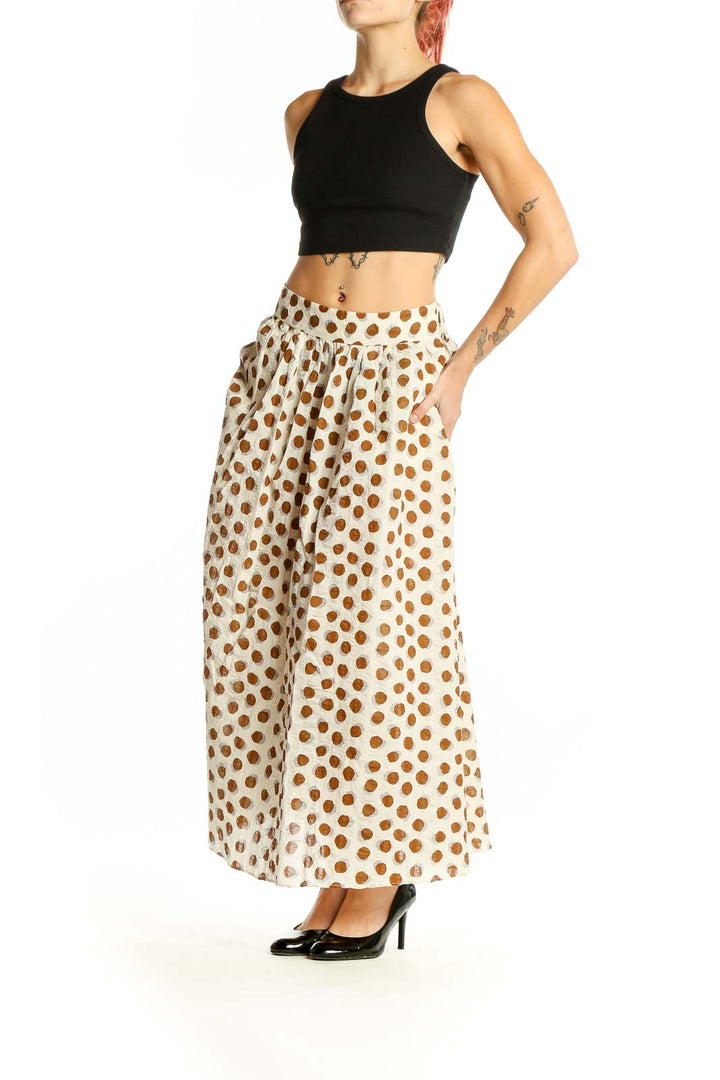 Front view of Mango white and brown polka dot cotton skirt