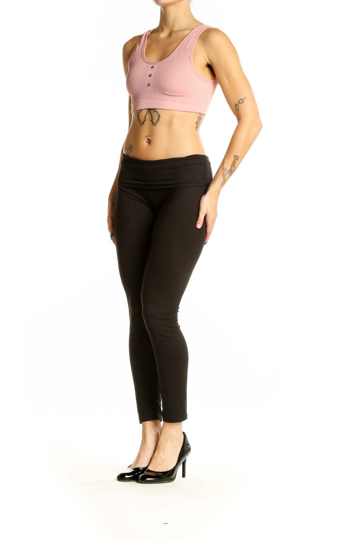 Front view of pink ribbed crop top with button detail by Lucky Brand