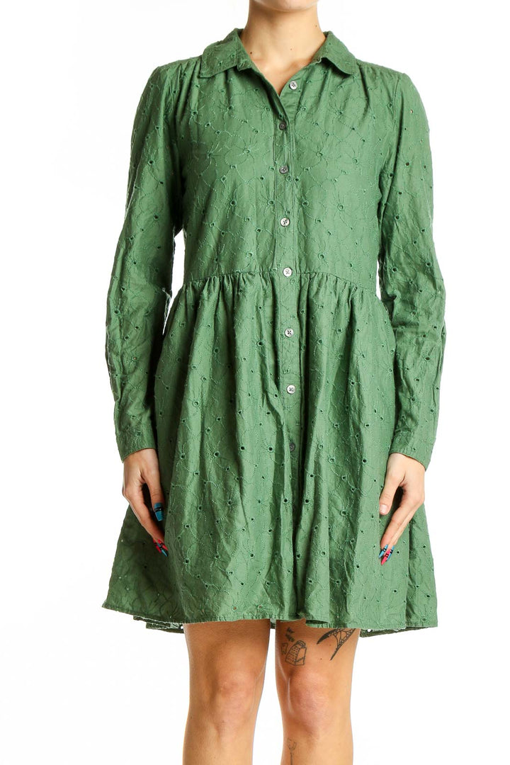 Front view of green cotton eyelet button-down dress from J.Crew