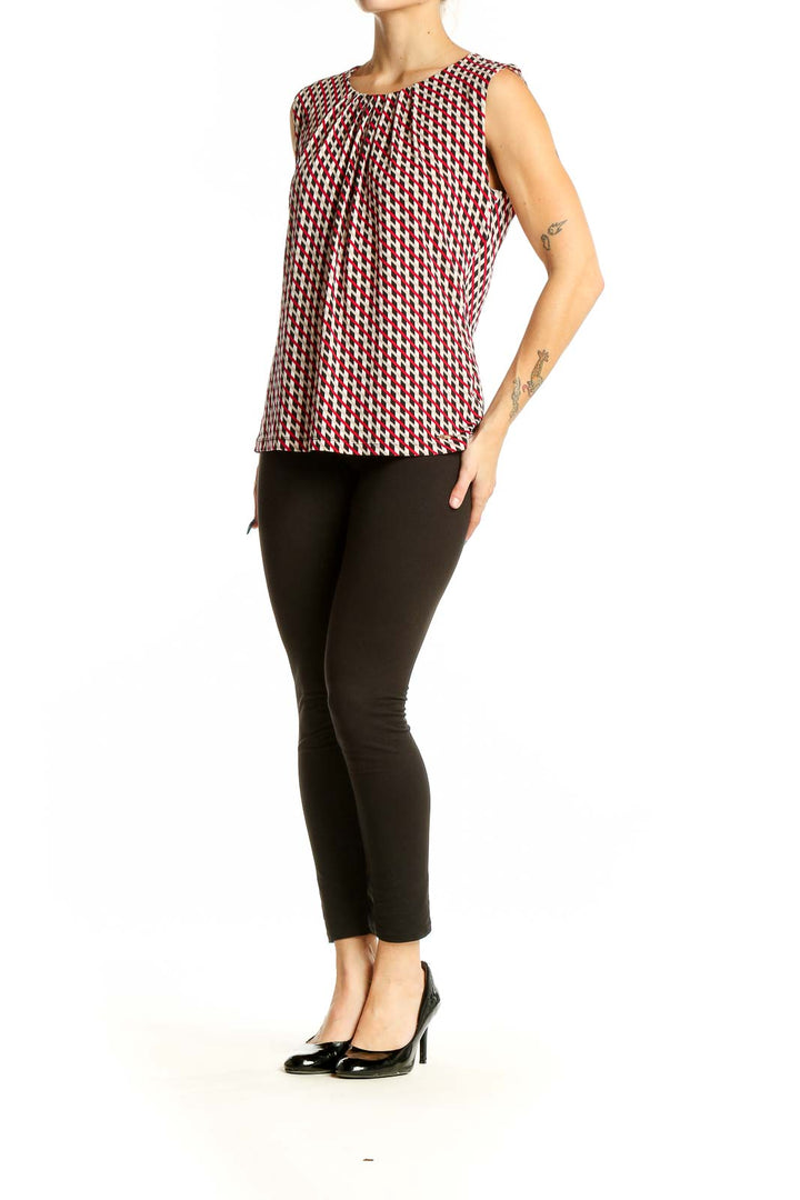 Front view of Calvin Klein red geometric print sleeveless top