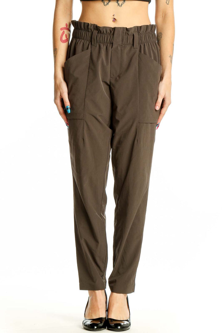 Front view of Athleta olive relaxed fit cargo pants with elastic waistband