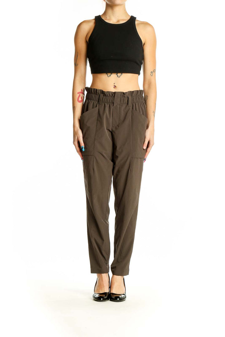 Front view of Athleta olive relaxed fit cargo pants with elastic waistband