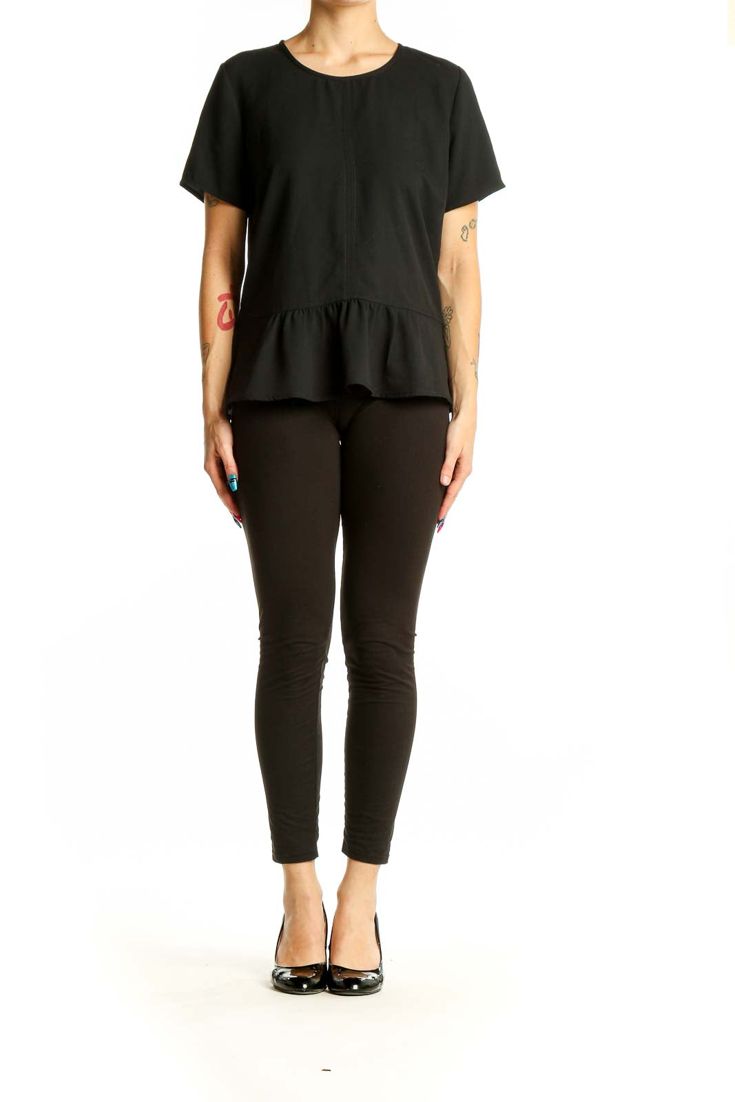 Front view of Ann Taylor black peplum top with short sleeves