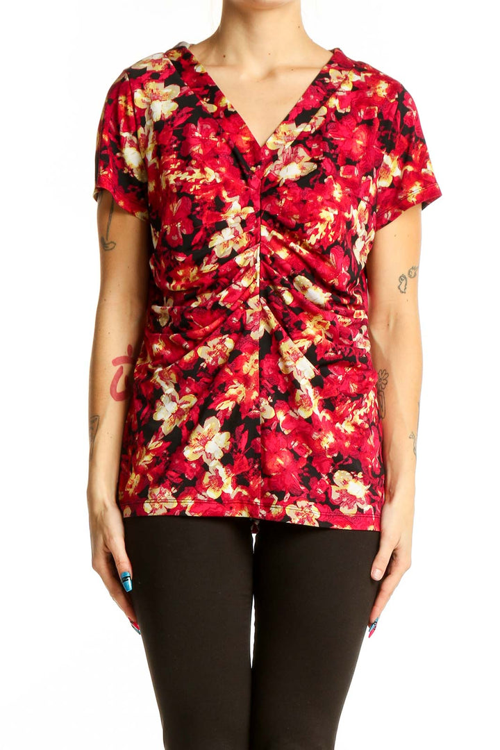 Front view of Alfani red floral ruched V-neck top