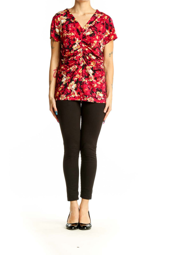 Front view of Alfani red floral ruched V-neck top