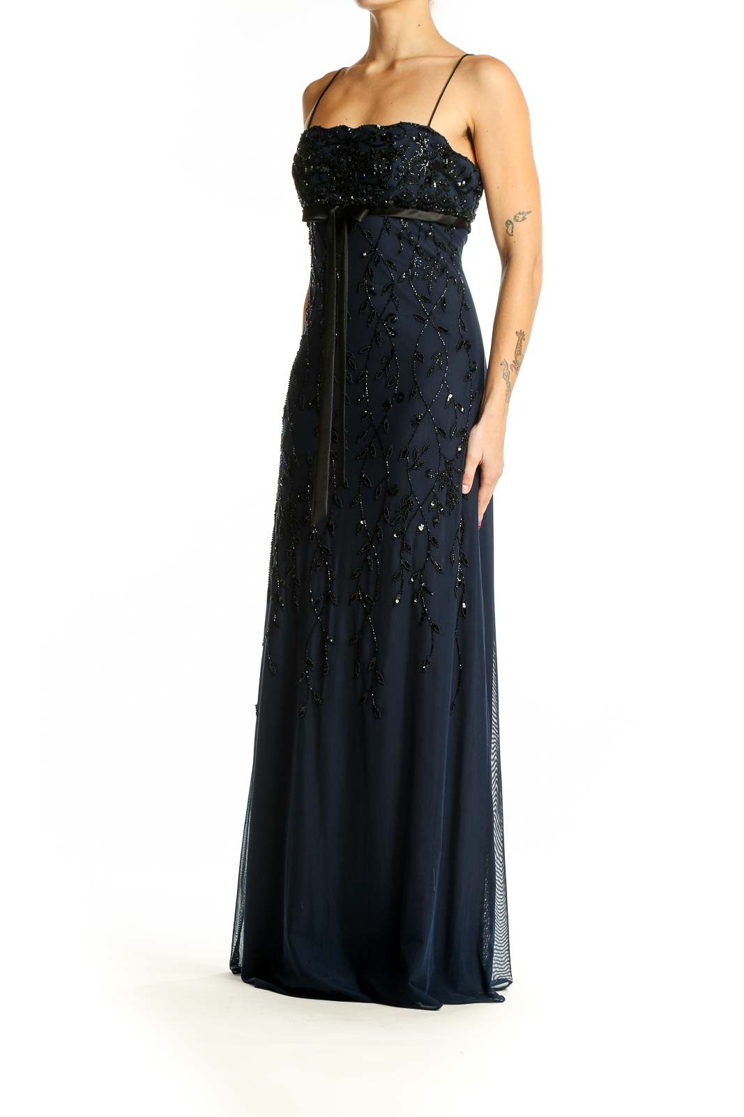 Front view of navy beaded empire waist gown by Dusk by Sheila Yen