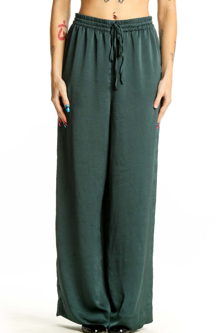 Front view of Madewell forest green wide-leg pants with drawstring waist